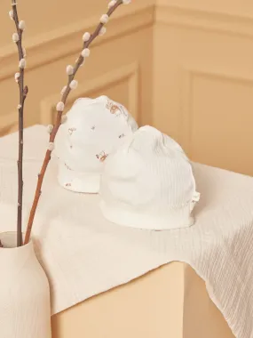 2 bonnets de naissance écrus en coton